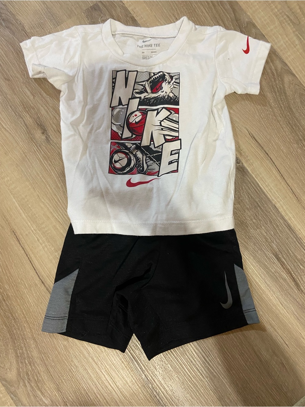 Nike White Graphic Tee with Black Athletic Shorts